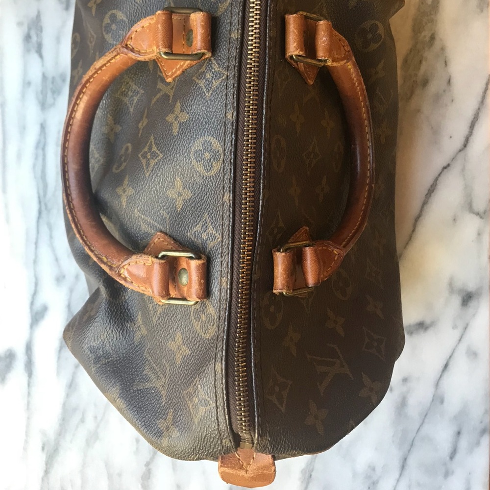 Authentic, pre-loved Louis Vuitton Speedy 30